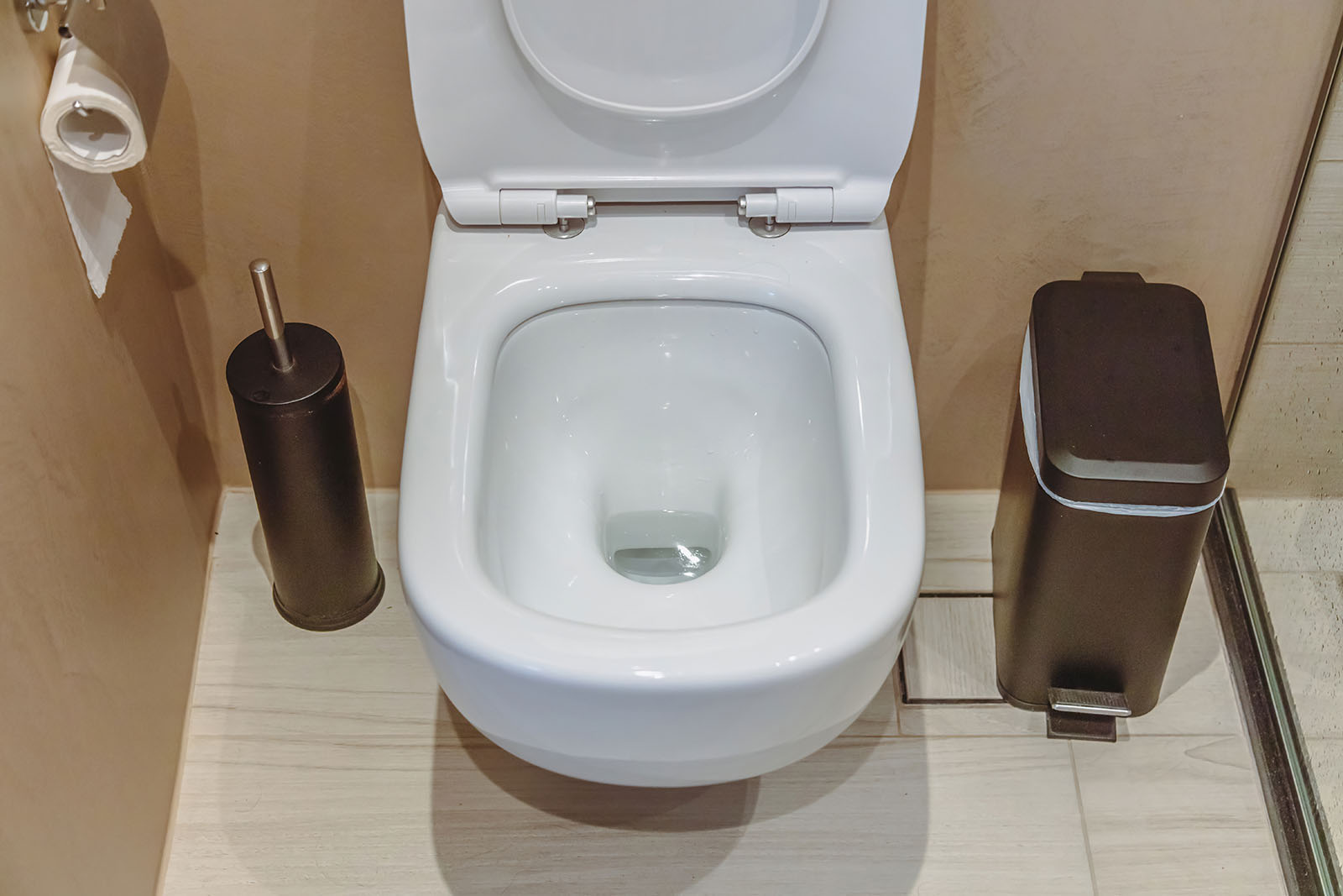 Toilet flushing with cleaning solution highlight septic system maintenance and effective septic inspection for optimal performance