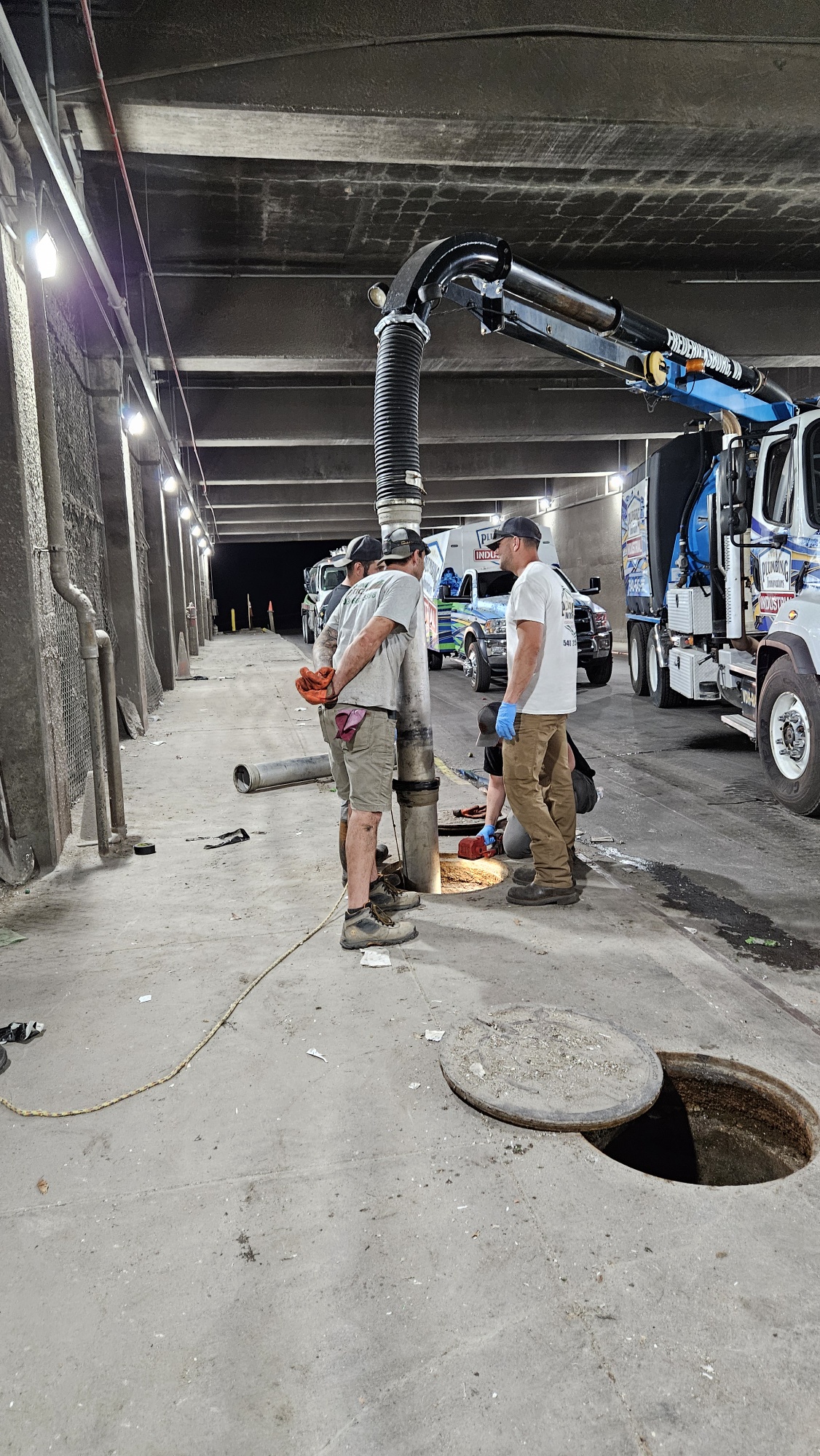 Septic tank pumping with employees